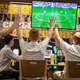 Image for article titled Man Invites Friends To Bar To Watch Game, Interact Fleetingly During Commercial Breaks